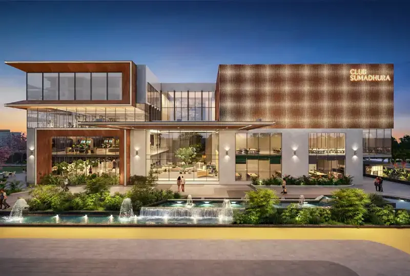 Club Sumadhura twilight view with fountains